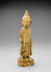 Figura del Buddha penitente, camminando e tenendo un bastone, stile Mandalay antico